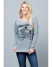 Get Hoppin' this Easter with our Bunny on Bike Comfy Sweatshirt